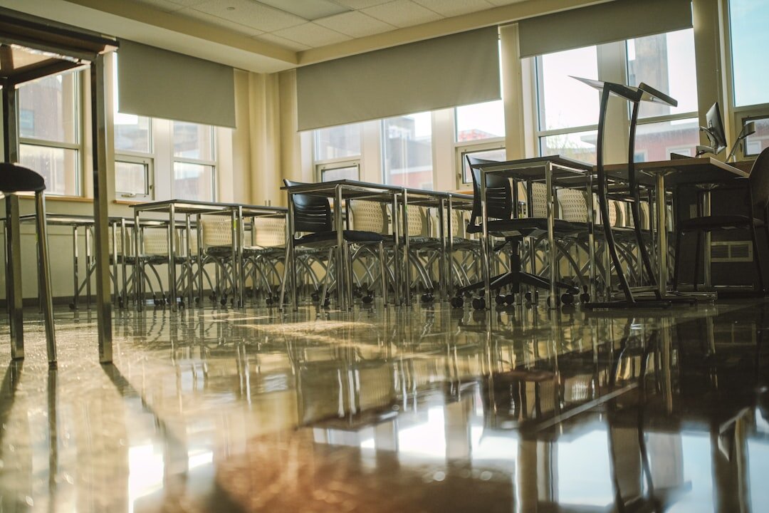 Journalism class students learning in a modern classroom