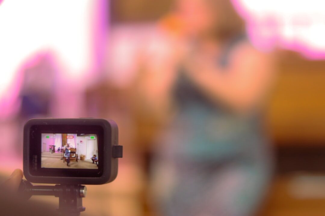Woman TV anchor presenting news on camera